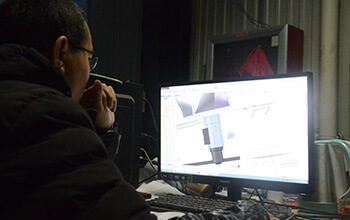 Equipe de P & D de fabricante de machinee de corte a laser